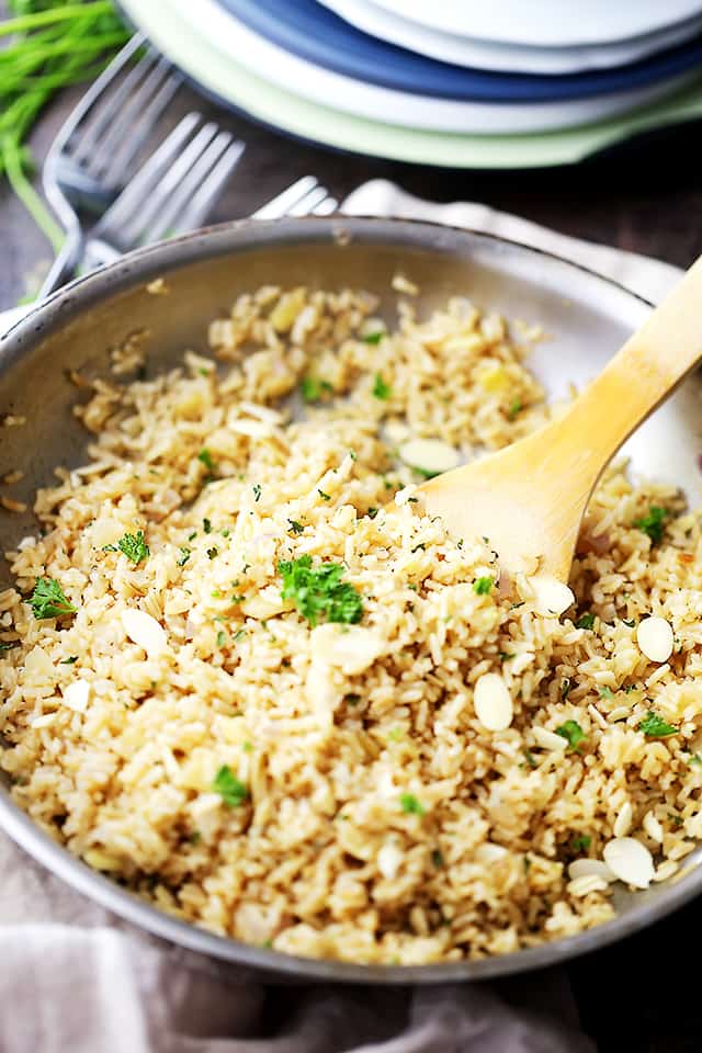 Almond Brown Rice Pilaf - Turn simple brown rice into a delicious healthy dish with toasted almonds, sweet shallots and parsley!