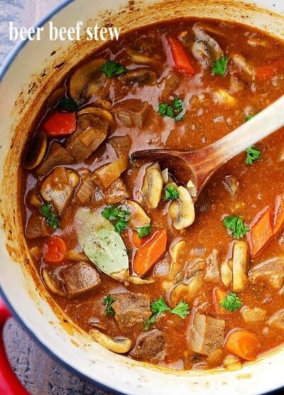 Beer Beef Stew Recipe - Super easy, but delicious and quick hearty stew cooked in a dutch oven with beef, mushrooms, carrots, and beer!