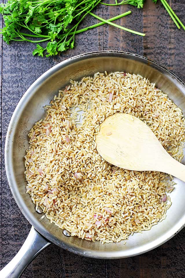 Almond Brown Rice Pilaf - Turn simple brown rice into a delicious healthy dish with toasted almonds, sweet shallots and parsley!