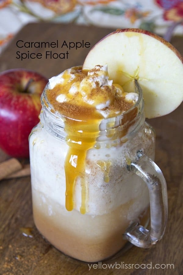 Caramel Apple Spice Float in a mason jar with an apple slice and caramel sauce on top