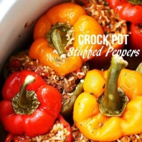 Crock Pot Stuffed Peppers - Loaded with spicy pork sausage, rice and tomatoes, these hearty and flavor-loaded peppers are the easiest and most perfect meal to serve to your family, and are also great for game day parties!