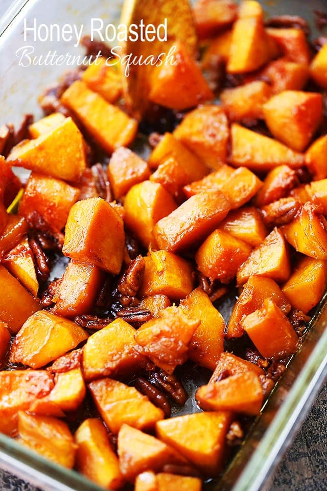 Honey Roasted Butternut Squash - A simple yet delicious side dish with roasted butternut squash and crunchy pecans combined with cinnamon and honey. It's perfect for weeknights and holidays, too!