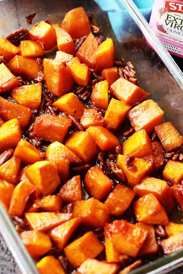 Roasted butternut squash with pecans in a mixture of honey and cinnamon.