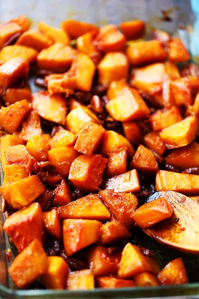 Roasted butternut squash with pecans in a mixture of honey and cinnamon.