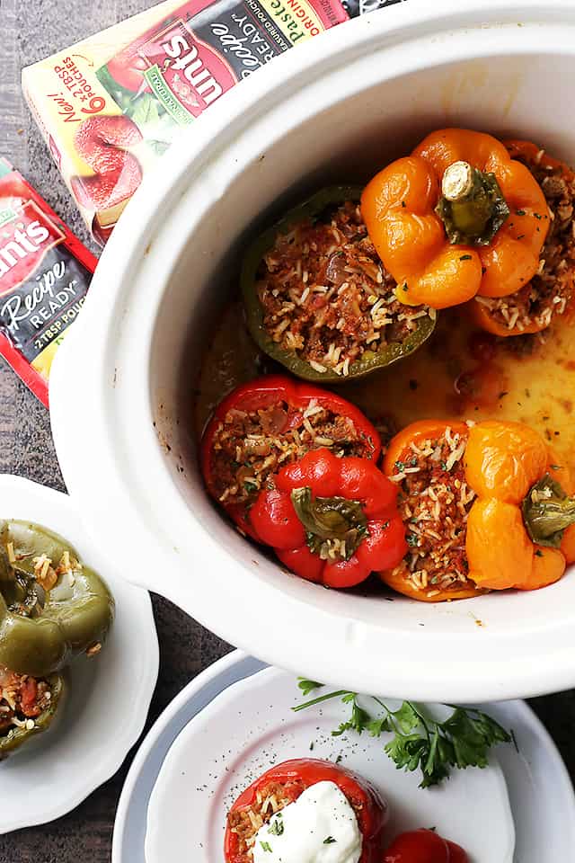Easy Stuffed Peppers arranged inside the insert of the crock pot. 