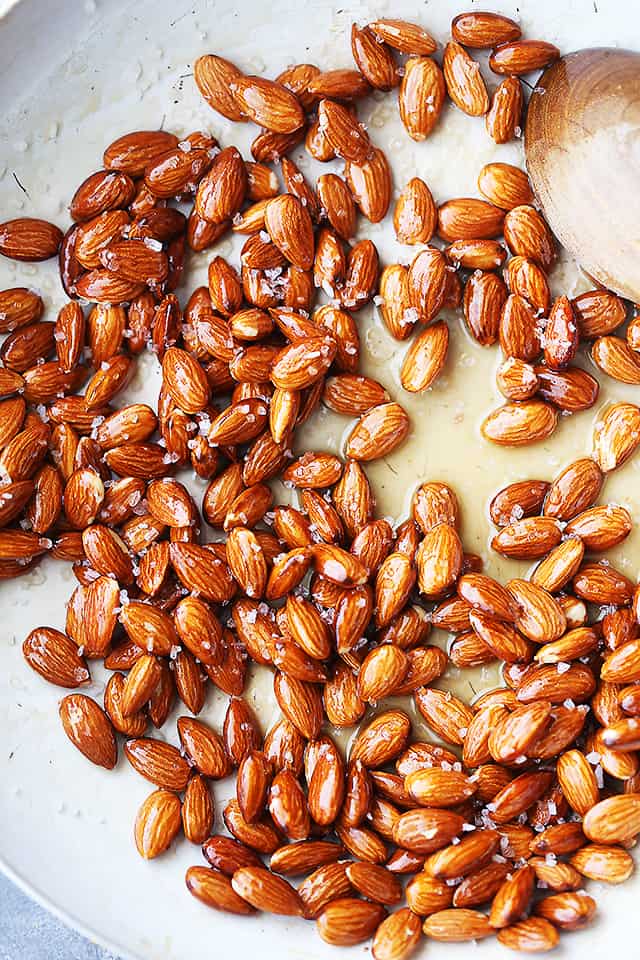 Honey Roasted Almonds - Simple, festive, healthy, and delicious almonds covered in honey and a sprinkle of salt! Perfect for snacking, or even gifting! 