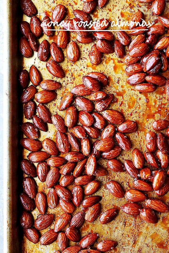 Close-up image of Honey Roasted Almonds on a baking sheet.