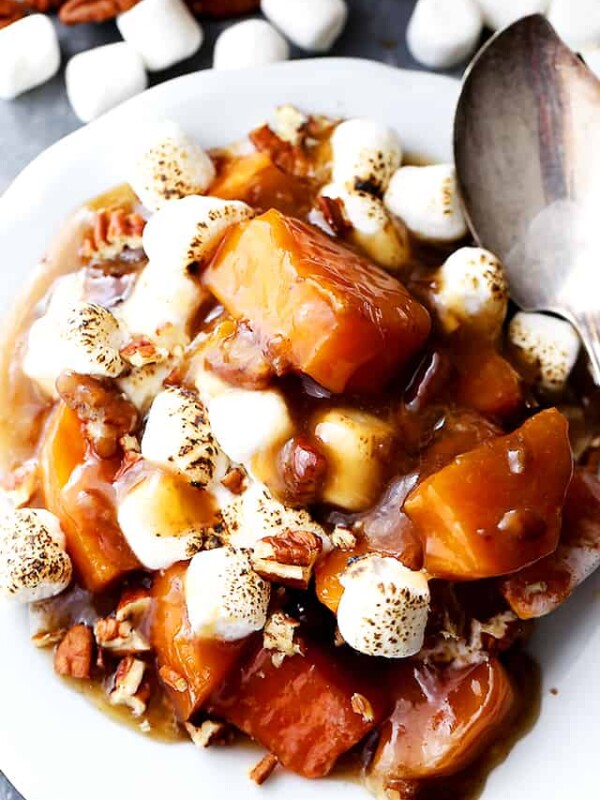 Sweet potato casserole with marshmallows served on a plate.