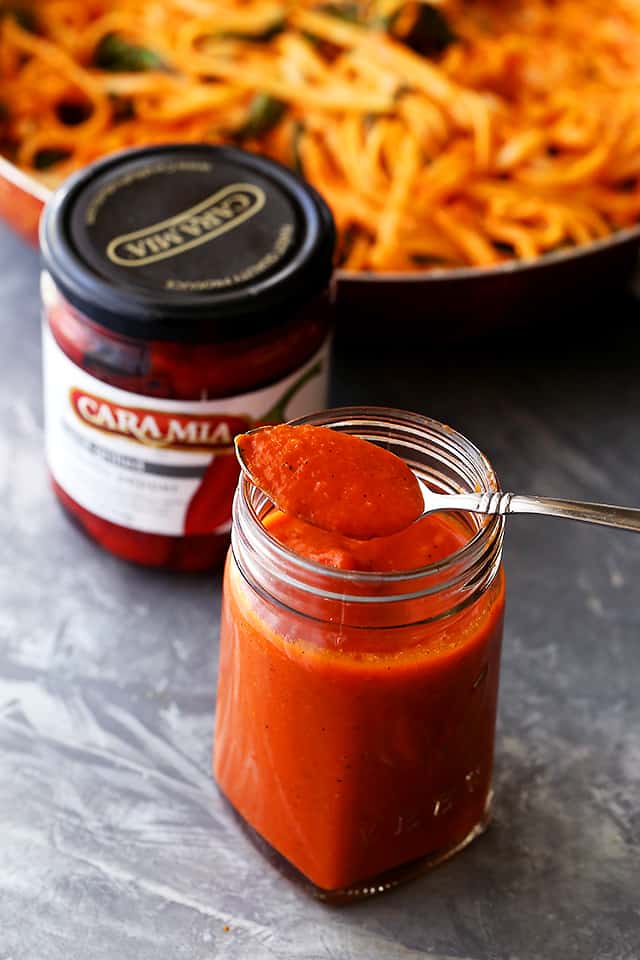 Red Pepper Sauce Pasta with Spinach and Feta - A perfect weeknight meal featuring sweet red peppers blended into a delicious and healthy sauce tossed with fettuccine pasta, spinach and feta cheese.