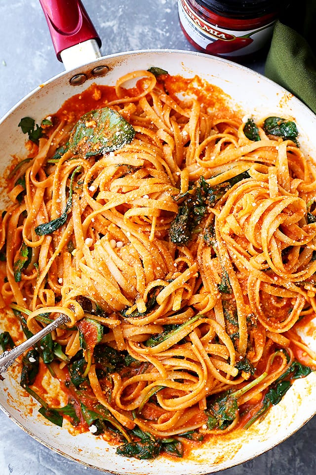 Red Pepper Sauce Pasta with Spinach and Feta - A perfect weeknight meal featuring sweet red peppers blended into a delicious and healthy sauce tossed with fettuccine pasta, spinach and feta cheese.