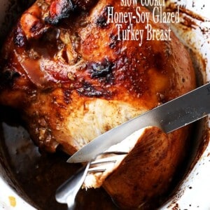 Slow Cooker Honey-Soy Glazed Turkey Breast title image featuring juicy honey glazed turkey breast being freshly carved.