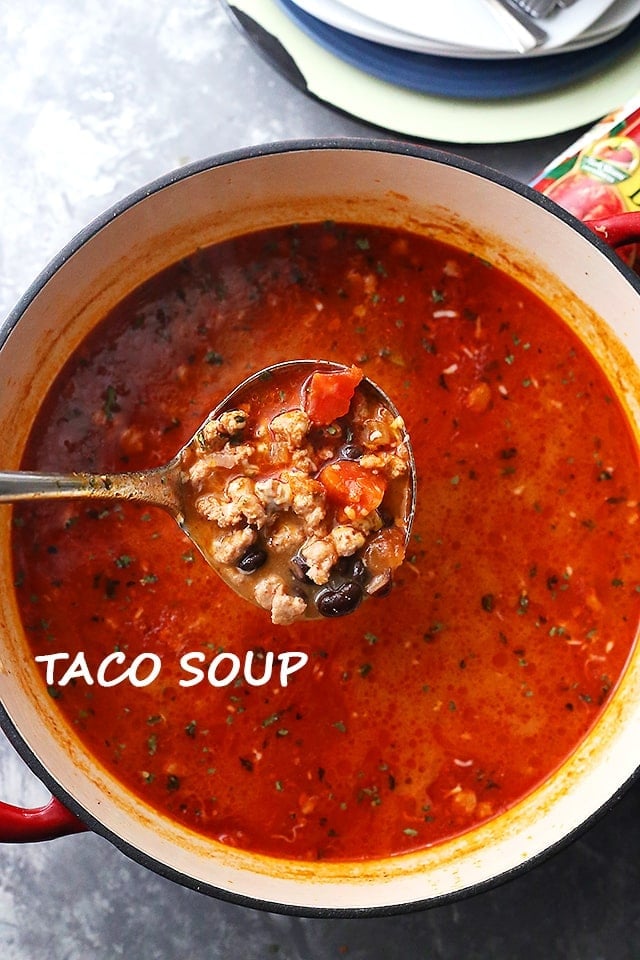 A Pot of Taco Soup with a Ladel Full of Soup Hovering Above it