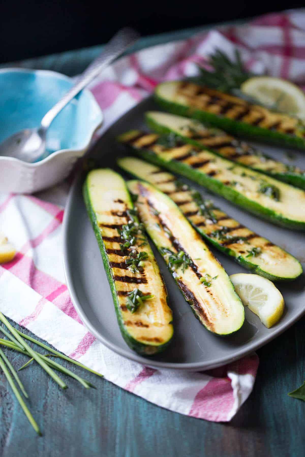 Grilled zucchini slices with herbs