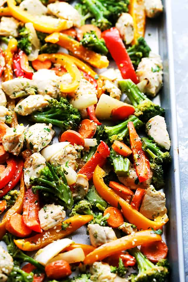 Sheet Pan Chicken "Stir Fry" - Just one pan and 30 minutes is all you will need to make this amazing meal! Skip the wok and make this quick and healthy chicken stir fry dinner in the oven!