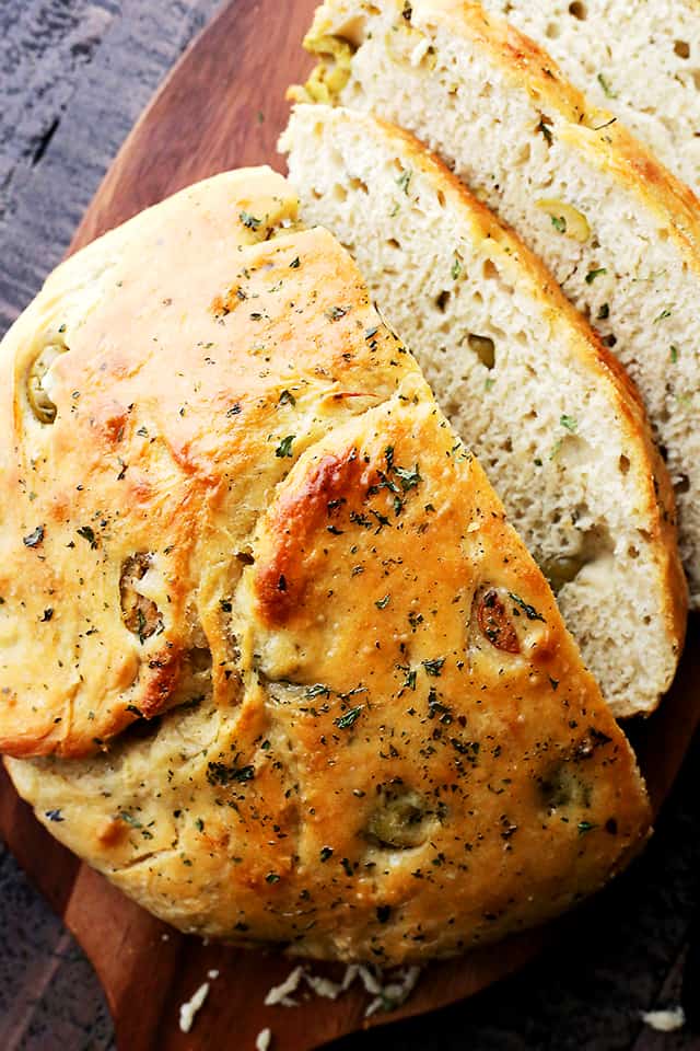 Close-up shot of sliced No Knead Skillet Olive Bread.