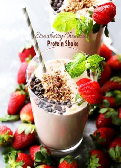 Strawberry Cheesecake Protein Shake - This amazing protein shake is just as delicious as a slice of strawberry cheesecake, BUT this is way healthier and it's packed with protein!