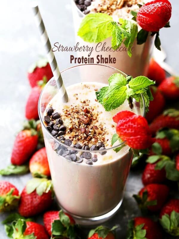 Strawberry Cheesecake Protein Shake - This amazing protein shake is just as delicious as a slice of strawberry cheesecake, BUT this is way healthier and it's packed with protein!