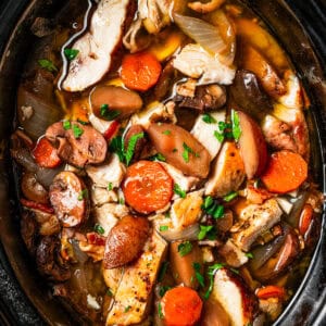 Coq au vin inside the slow cooker.