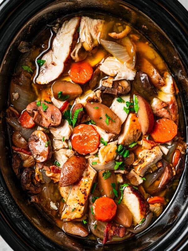 Coq au vin inside the slow cooker.