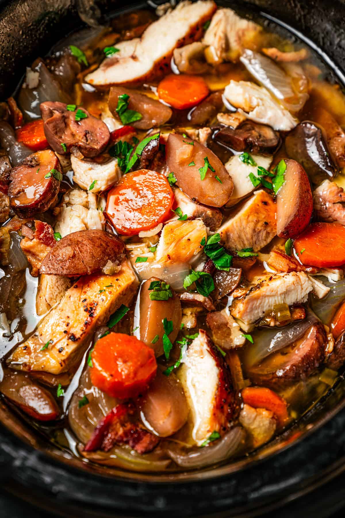 Cooking coq au vin in a slow cooker.