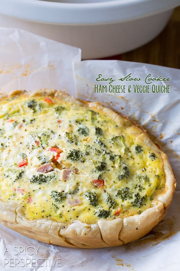 Easy Slow Cooker Quiche with chopped vegetables on parchment paper