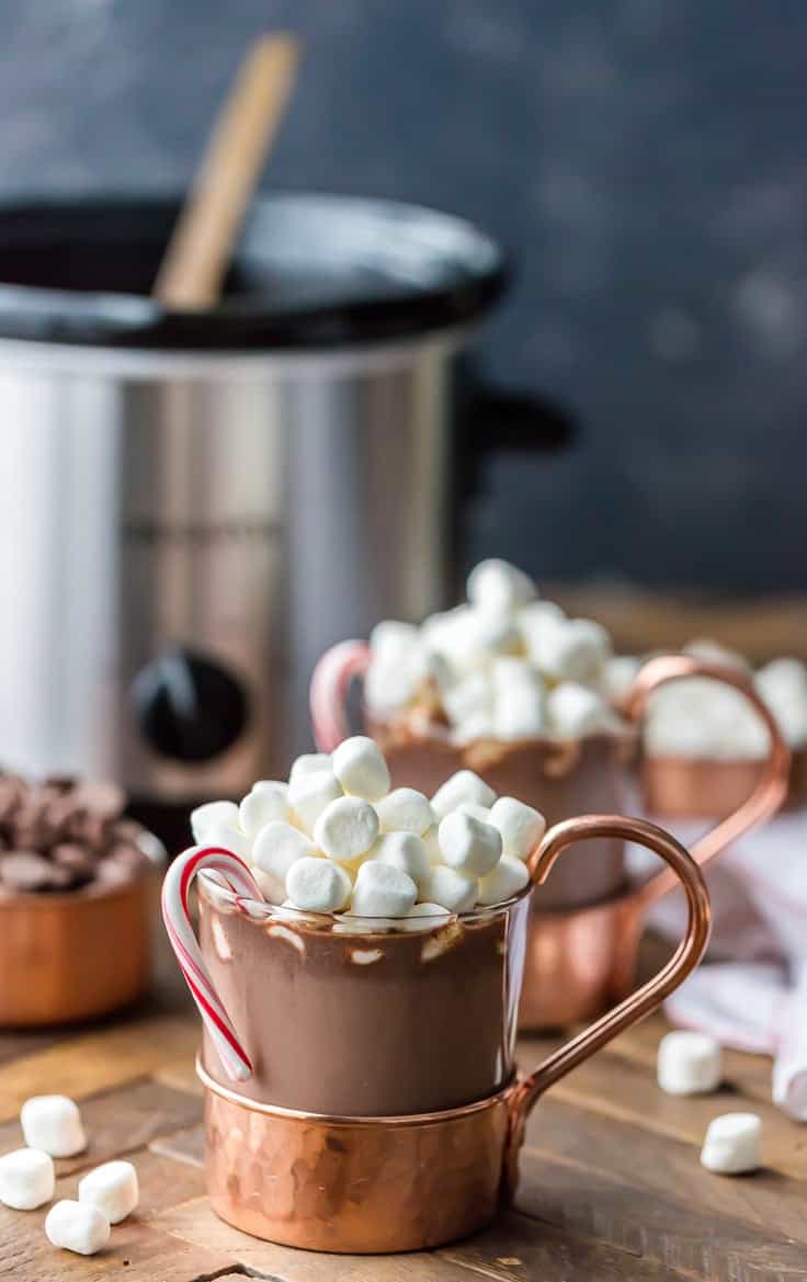 Hot cocoa in mugs topped with mini marshmallows
