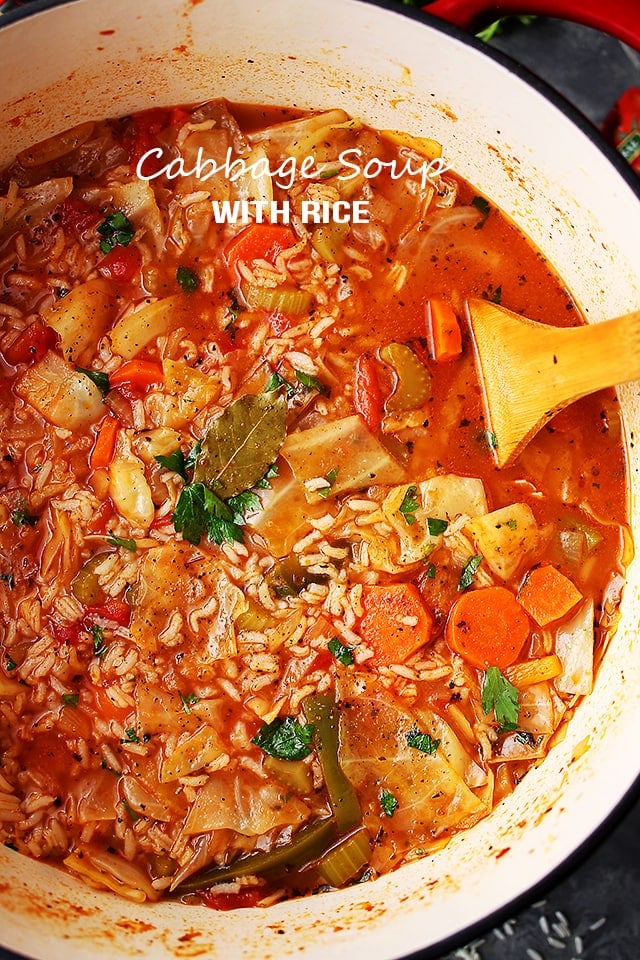 Cabbage soup with rice in a soup pot.