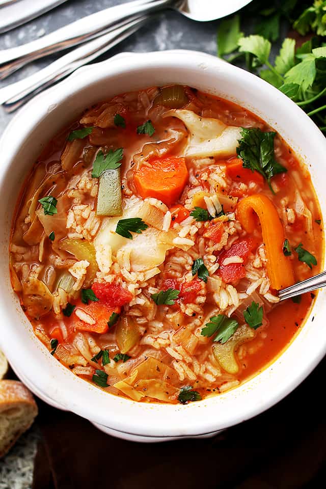 Cabbage soup with rice served in a bowl.