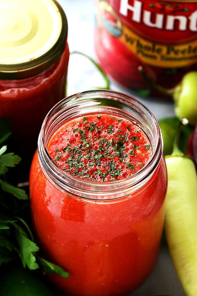 Homemade salsa stored in a jar.