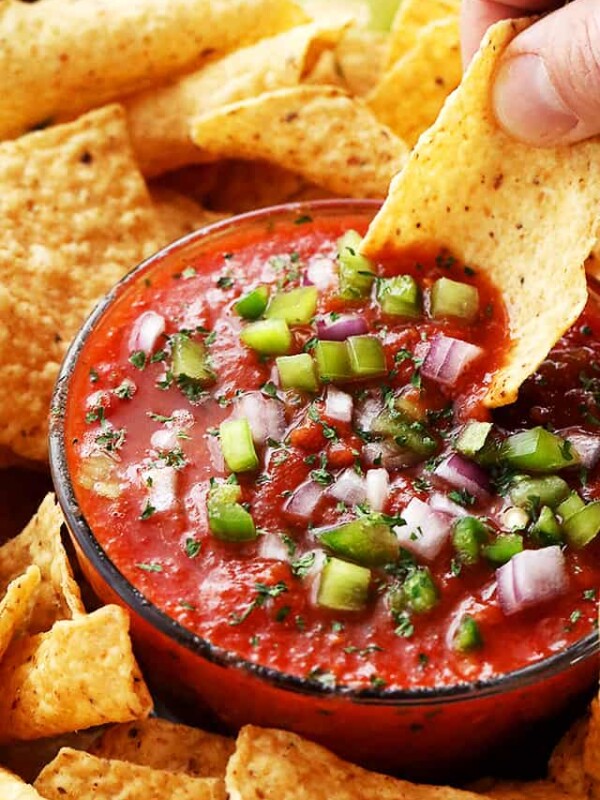 Homemade Restaurant Style Salsa - Super easy to make chunky homemade salsa made with delicious ingredients, and 1000x better than any store-bought version. Takes minutes to whip up and tastes amazing!