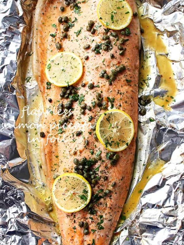 Flourless Salmon Piccata in Foil - A healthy and incredibly delicious dinner with flourless piccata sauce poured over salmon and cooked in foil.