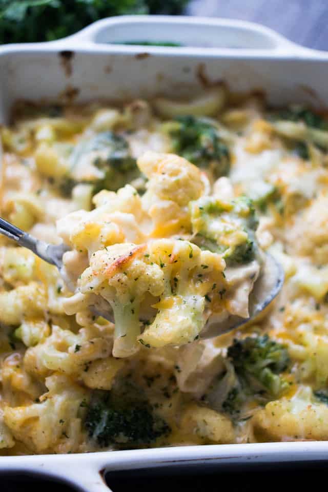 Garlicky and Cheesy Cauliflower Broccoli Bake - A lighter version of everyone's favorite rich and cheesy cauliflower broccoli bake! Or is it casserole? Gratin? Whatevs, it's still so darn good!