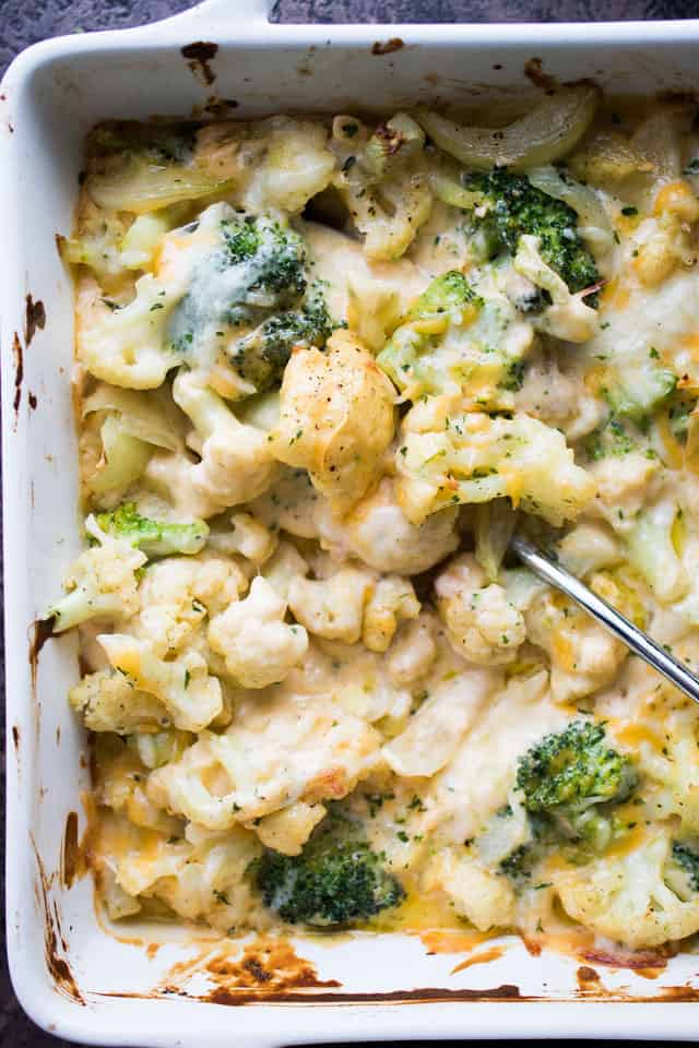 Garlicky and Cheesy Cauliflower Broccoli Bake - A lighter version of everyone's favorite rich and cheesy cauliflower broccoli bake!