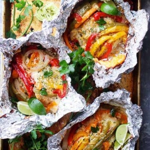 Chicken and Rice Fajitas in Foil - Incredibly delicious and easy to prepare fajitas with chicken, peppers, onions and rice all cooked in foil packets. Easy, quick and SO GOOD!