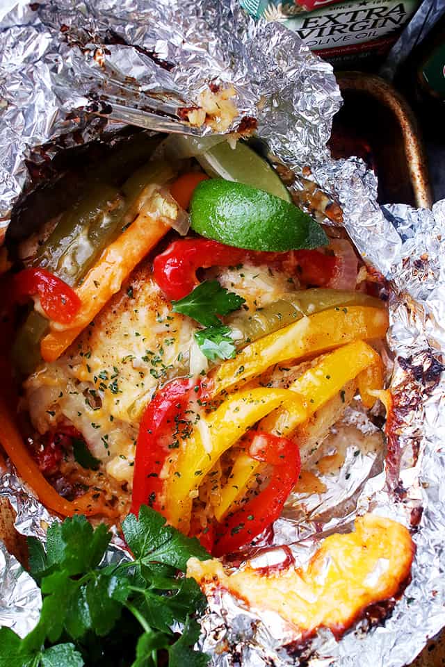 Overhead, close-up image of Chicken Fajitas in a foil pack.