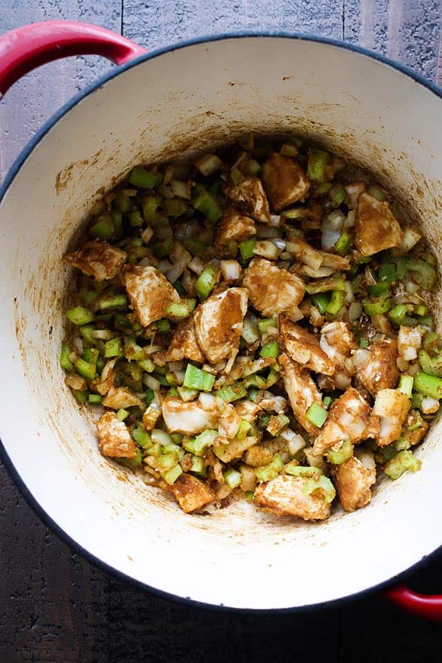 Chicken and celery cooking in a pot