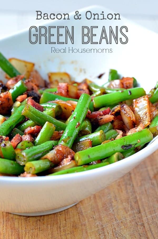 Green beans with bacon and onion in a serving bowl