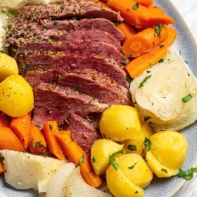 Sliced corned beef on a plate.