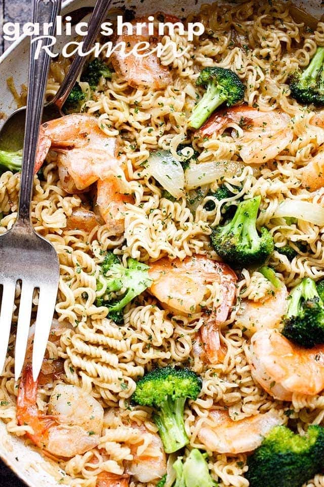 ramen noodles, shrimp, and broccoli cooking in a skillet