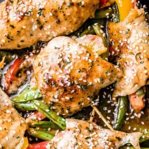 Honey Garlic Chicken and Vegetables Rollups - Quick and easy chicken breast rollups stuffed with colorful vegetables and cooked in an amazing honey garlic sauce.