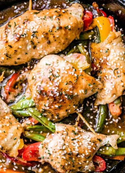 Honey Garlic Chicken and Vegetables Rollups - Quick and easy chicken breast rollups stuffed with colorful vegetables and cooked in an amazing honey garlic sauce.