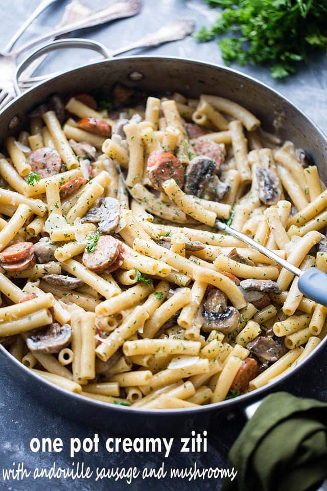 One Pot Creamy Ziti with Andouille Sausage and Mushrooms - This wonderful creamless creamy ziti pasta dinner is jam packed with delicious andouille sausages and mushrooms, and it's prepared in one pot and on the stovetop!