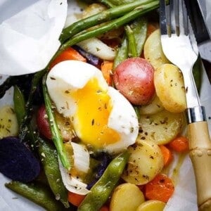 Spring Vegetables and Potatoes Baked in Parchment - Asparagus, snap peas, carrots and potatoes tossed with garlic and olive oil roast up to a deliciously moist and tender perfection inside parchment paper packs. A healthy, fast and real easy must-make-now-side-dish.
