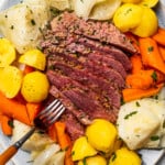 Sliced corned beef on a plate.