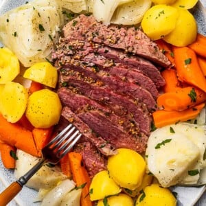 Sliced corned beef on a plate.