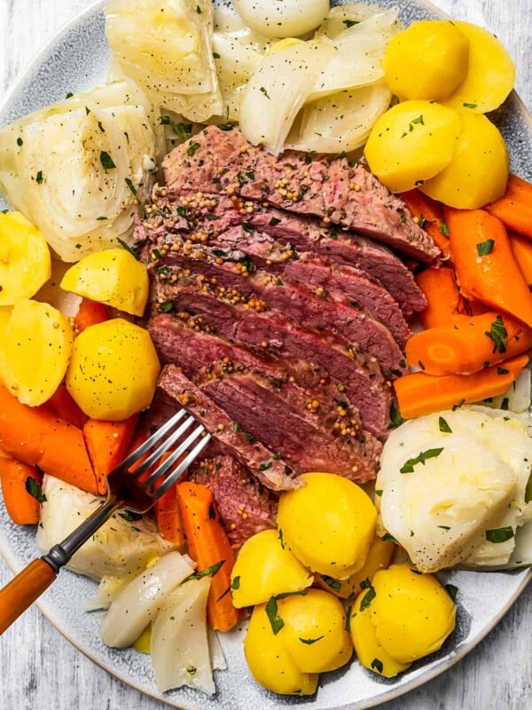 Sliced corned beef on a plate.