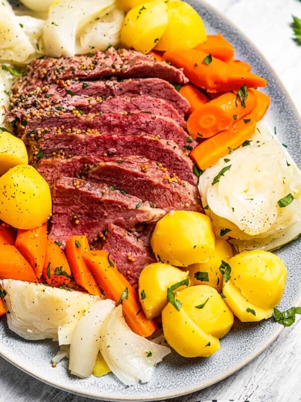 Sliced corned beef on a plate.