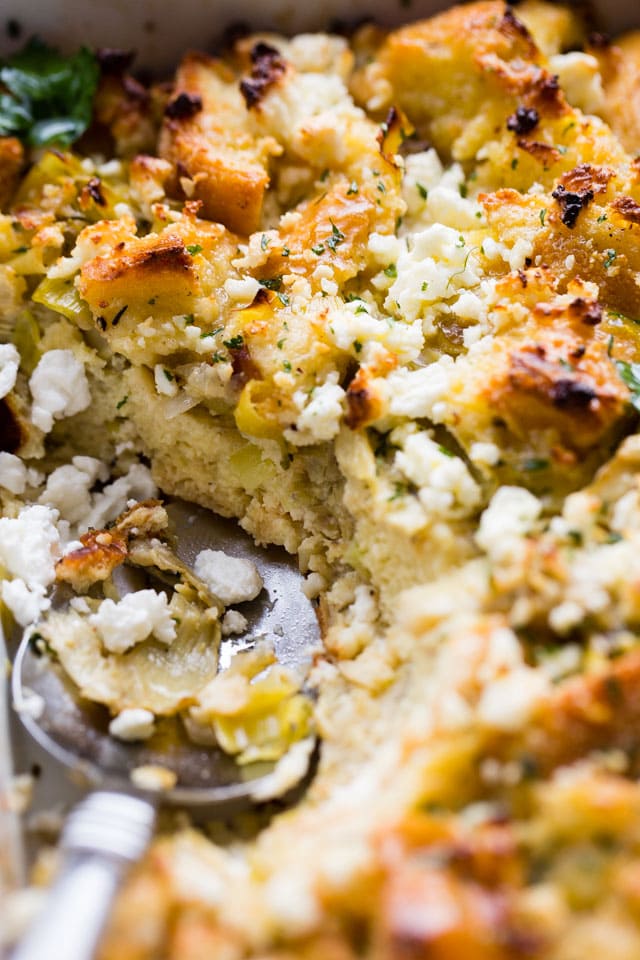 Artichokes and Feta Cheese Strata - An amazing brunch or breakfast layered casserole with day-old bread, artichokes, and feta cheese.