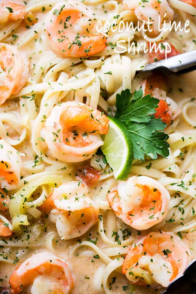 Coconut Lime Shrimp – Deliciously creamy shrimp cooked in an amazing coconut lime sauce with tomatoes and peppers, and served over noodles or rice.