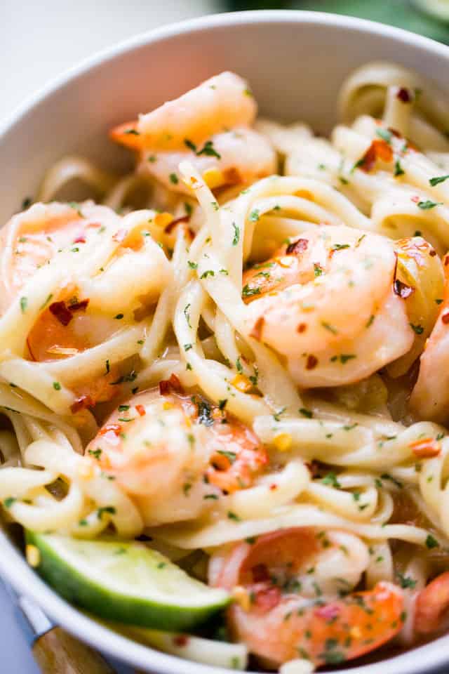 Coconut Lime Shrimp - Deliciously creamy shrimp cooked in an amazing coconut lime sauce and served over noodles or rice.